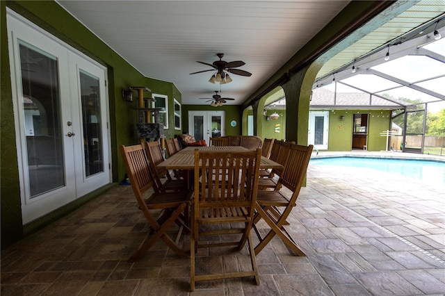 7550 Jomel Dr, Weeki Wachee, FL 34607 - view of patio / terrace featuring french doors, a ceiling fan, an outdoor pool, and a lanai
