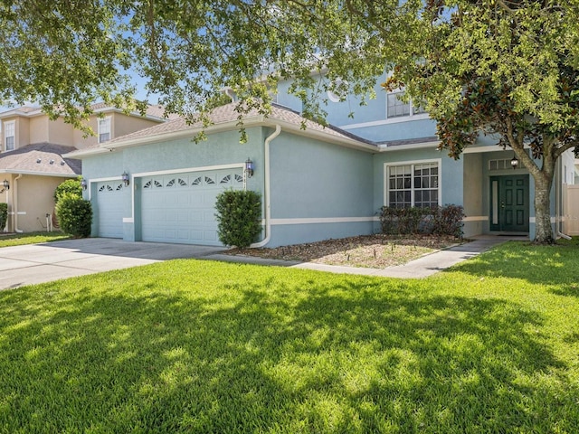 4481 Birchfield Loop, Spring Hill, FL 34609 - view of front of property with a garage, a front lawn, stucco siding, and driveway
