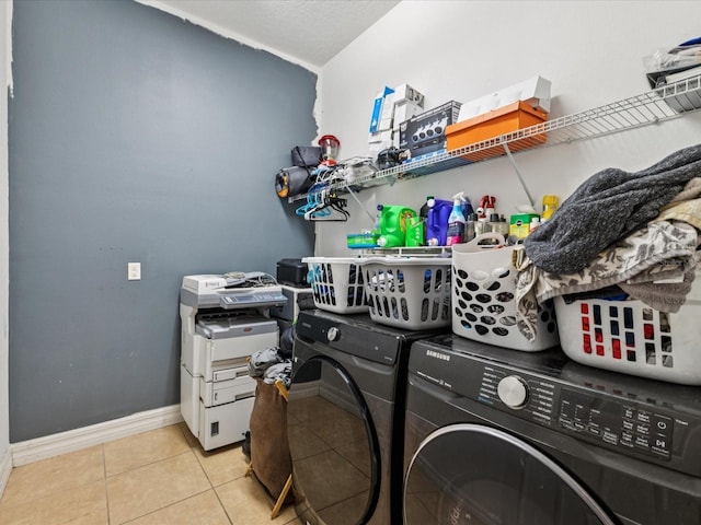 4481 Birchfield Loop, Spring Hill, FL 34609 - laundry room with separate washer and dryer and tile patterned flooring