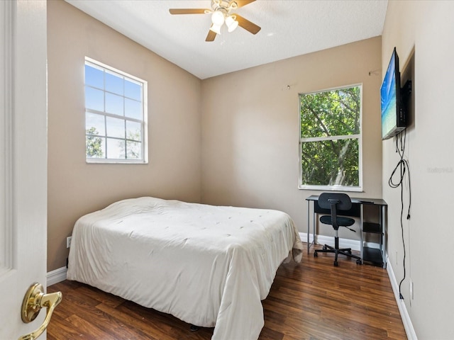 4481 Birchfield Loop, Spring Hill, FL 34609 - bedroom featuring multiple windows, wood finished floors, and ceiling fan