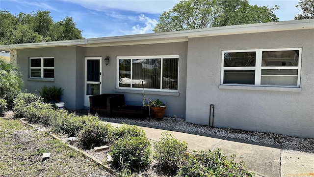 723 W Bayshore Dr, Tarpon Springs, FL 34689 - view of front of home with stucco siding