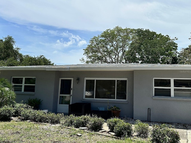 723 W Bayshore Dr, Tarpon Springs, FL 34689 - view of front of property featuring stucco siding