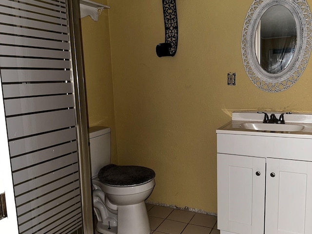723 W Bayshore Dr, Tarpon Springs, FL 34689 - bathroom with tile patterned flooring, vanity, and radiator heating unit