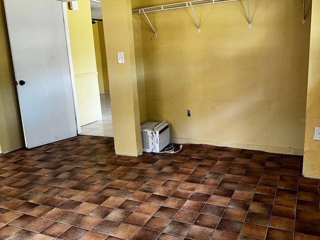 723 W Bayshore Dr, Tarpon Springs, FL 34689 - unfurnished bedroom with brick patterned floors