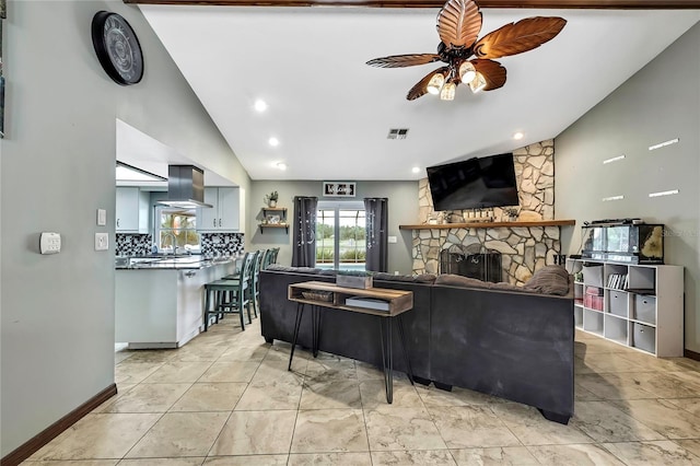 364 Waterfall Dr, Spring Hill, FL 34608 - living area with a ceiling fan, a stone fireplace, high vaulted ceiling, and recessed lighting