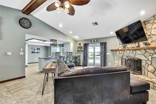 364 Waterfall Dr, Spring Hill, FL 34608 - living room with ceiling fan, a stone fireplace, and recessed lighting