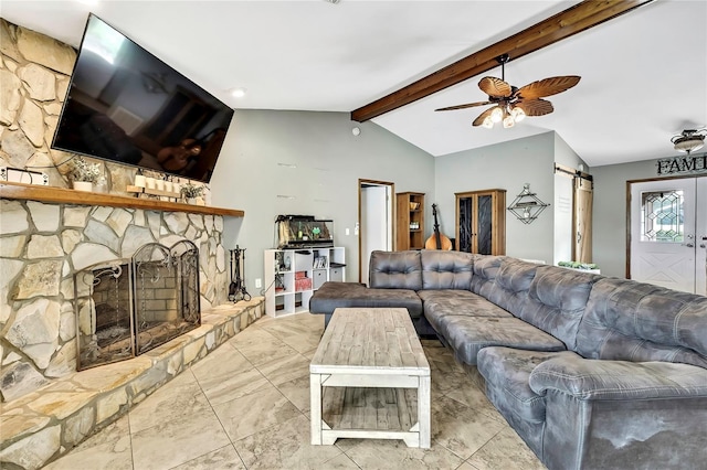 364 Waterfall Dr, Spring Hill, FL 34608 - living room with a barn door, ceiling fan, and a stone fireplace
