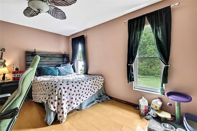 364 Waterfall Dr, Spring Hill, FL 34608 - bedroom featuring wood finished floors