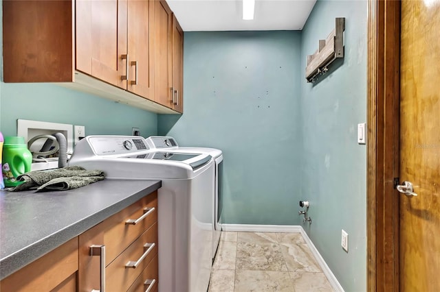 364 Waterfall Dr, Spring Hill, FL 34608 - washroom with cabinet space, independent washer and dryer, and light marble finish floors
