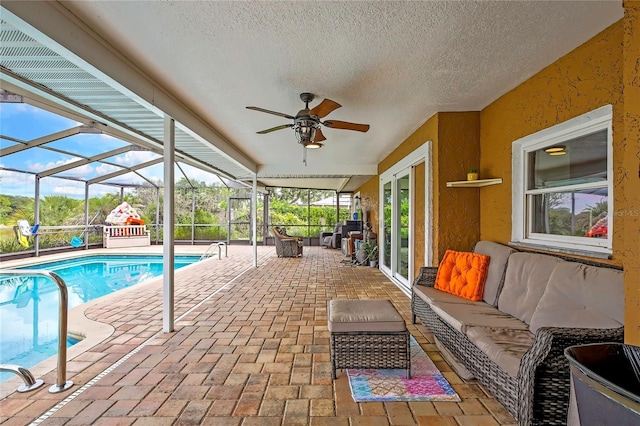 364 Waterfall Dr, Spring Hill, FL 34608 - outdoor pool featuring a patio area, an outdoor living space, ceiling fan, and a lanai