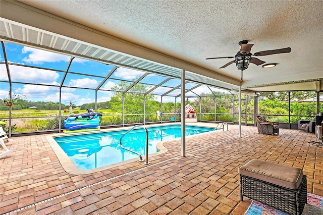 364 Waterfall Dr, Spring Hill, FL 34608 - swimming pool with a patio area, a lanai, and ceiling fan