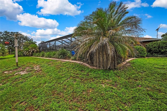 364 Waterfall Dr, Spring Hill, FL 34608 - view of grassy yard with a lanai