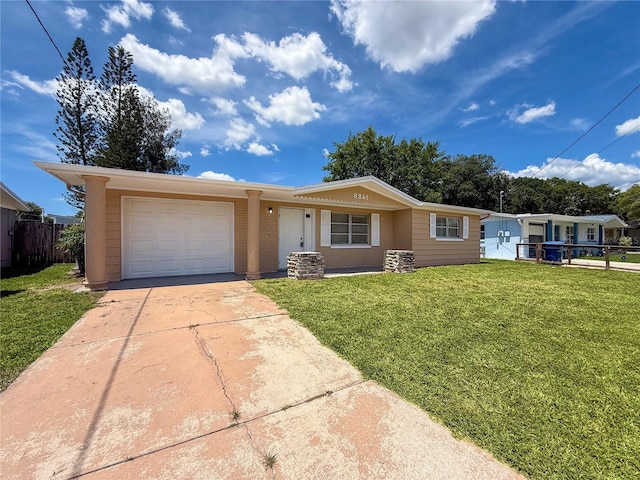 6341 Hyperion Dr, Port Richey, FL 34668 - ranch-style house featuring an attached garage and concrete driveway