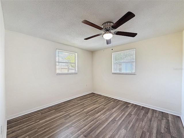 6341 Hyperion Dr, Port Richey, FL 34668 - unfurnished room with dark wood finished floors, a textured ceiling, and ceiling fan