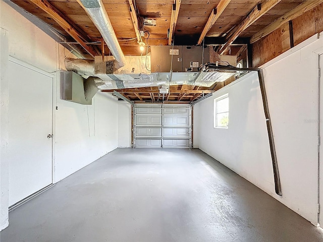 6341 Hyperion Dr, Port Richey, FL 34668 - garage featuring a garage door opener