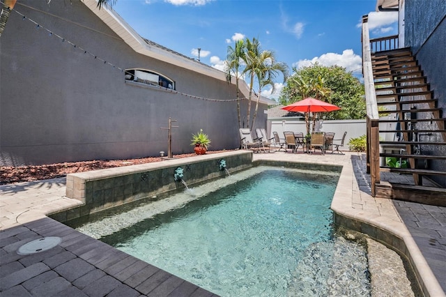 3450 Ferrell St, New Port Richey, FL 34655 - view of pool with stairs and a patio area
