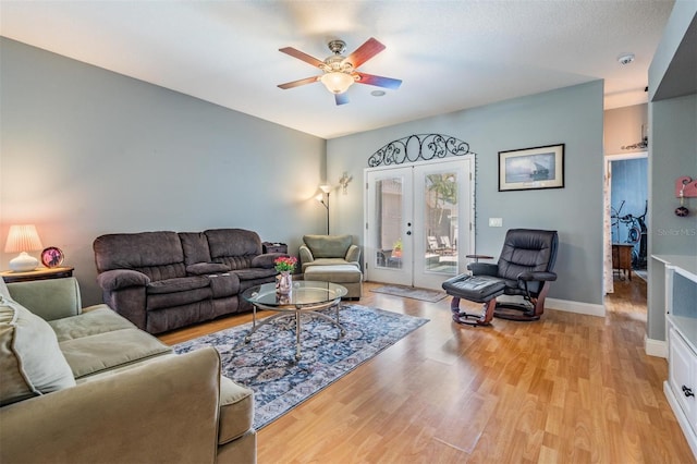 3450 Ferrell St, New Port Richey, FL 34655 - living area with light wood-type flooring, ceiling fan, and french doors