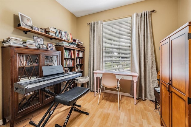 3450 Ferrell St, New Port Richey, FL 34655 - living area with light wood-style floors and an office area
