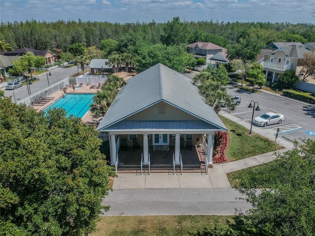 3450 Ferrell St, New Port Richey, FL 34655 - aerial view of a heavily wooded area and a pool