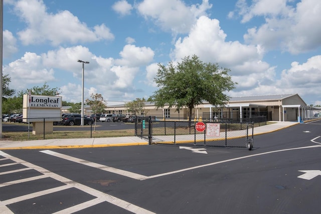3450 Ferrell St, New Port Richey, FL 34655 - view of asphalt street with traffic signs and street lighting