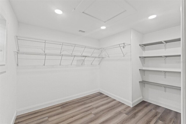 5724 Casson Ave, New Port Richey, FL 34652 - spacious closet featuring wood finished floors
