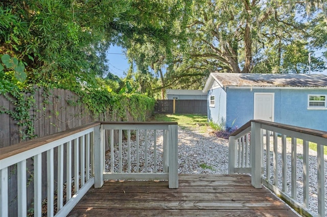 5724 Casson Ave, New Port Richey, FL 34652 - wooden deck with a fenced backyard