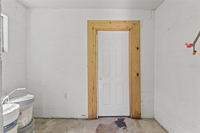 5724 Casson Ave, New Port Richey, FL 34652 - empty room featuring unfinished concrete flooring