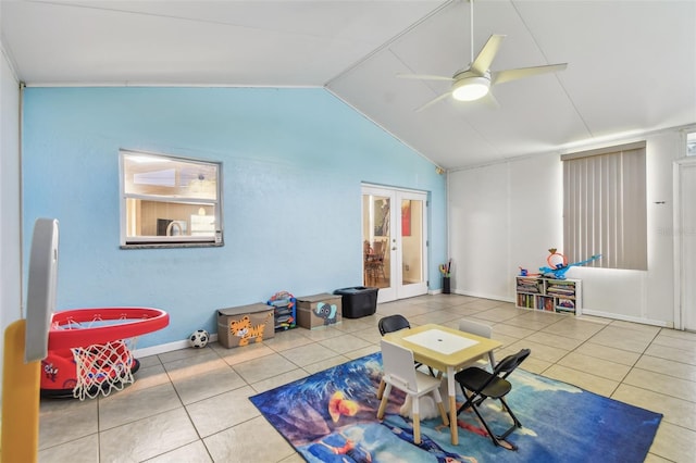 1071 Lexington Ct, Largo, FL 33771 - tiled living room featuring french doors, lofted ceiling, and ceiling fan