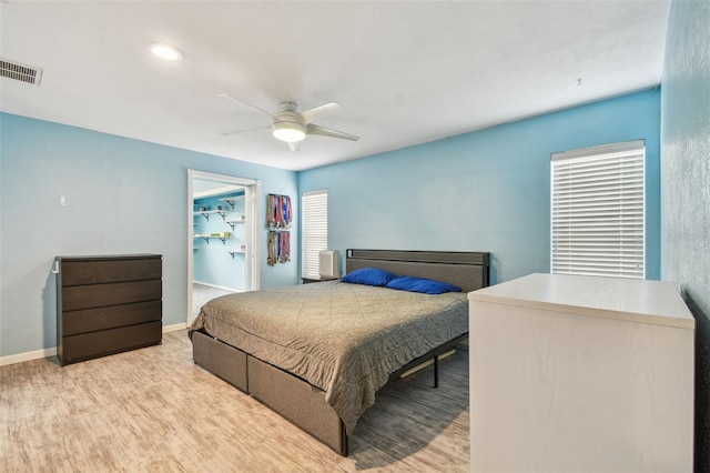 1071 Lexington Ct, Largo, FL 33771 - bedroom featuring wood finished floors and a ceiling fan