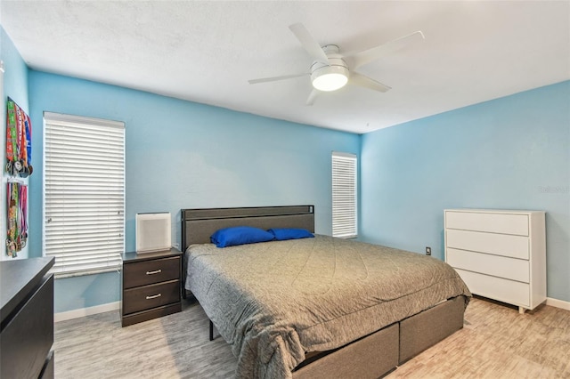 1071 Lexington Ct, Largo, FL 33771 - bedroom featuring wood finished floors and a ceiling fan