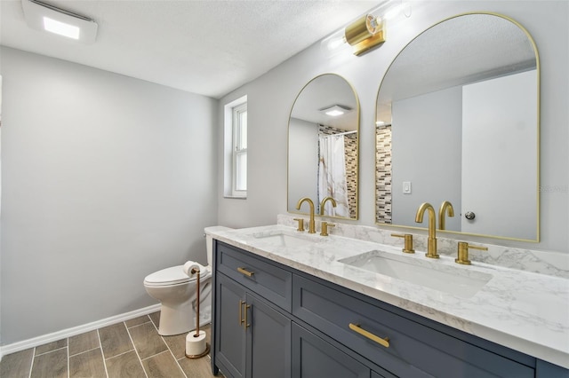 1071 Lexington Ct, Largo, FL 33771 - bathroom with double vanity and wood finish floors