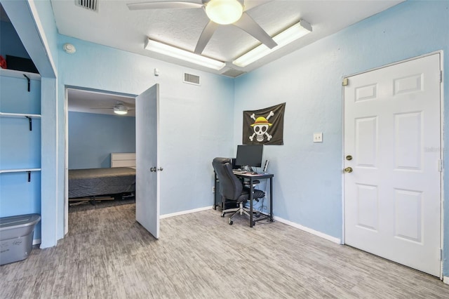 1071 Lexington Ct, Largo, FL 33771 - office featuring a ceiling fan and wood finished floors