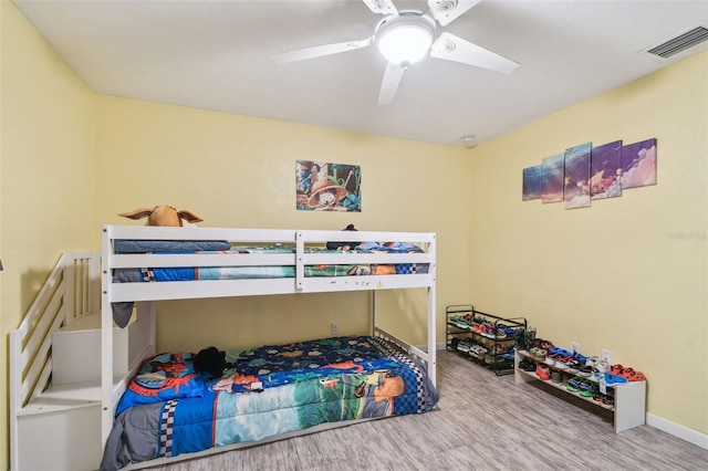 1071 Lexington Ct, Largo, FL 33771 - bedroom featuring wood finished floors and ceiling fan