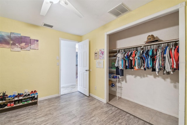 1071 Lexington Ct, Largo, FL 33771 - bedroom featuring a closet, wood finished floors, and ceiling fan
