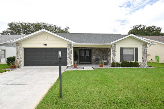 4702 Portland Manor Dr, New Port Richey, FL 34655 - ranch-style home featuring stone siding, an attached garage, a front yard, and concrete driveway