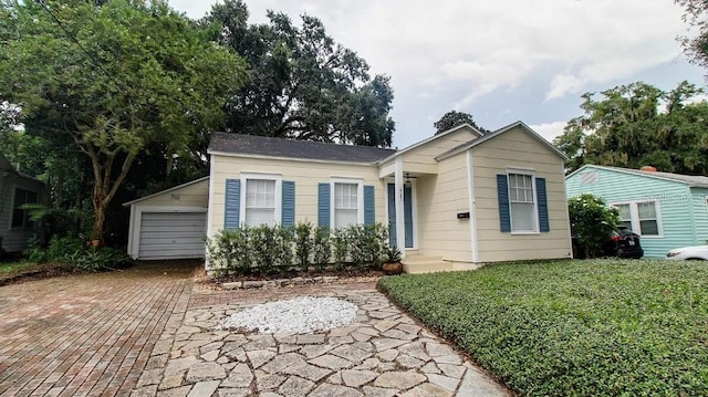 423 E Kaley St, Orlando, FL 32806 - view of front of home featuring a garage and driveway