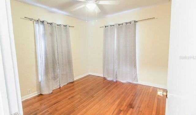 423 E Kaley St, Orlando, FL 32806 - empty room with hardwood / wood-style floors and ceiling fan