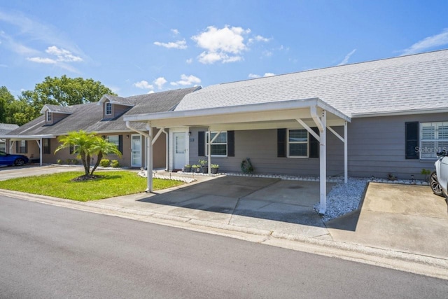 6702 Dartmoor Ln Unit 7A, New Port Richey, FL 34653 - view of front of property with a front yard