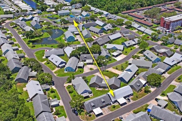 6702 Dartmoor Ln Unit 7A, New Port Richey, FL 34653 - aerial view of property's location with a nearby body of water and nearby suburban area