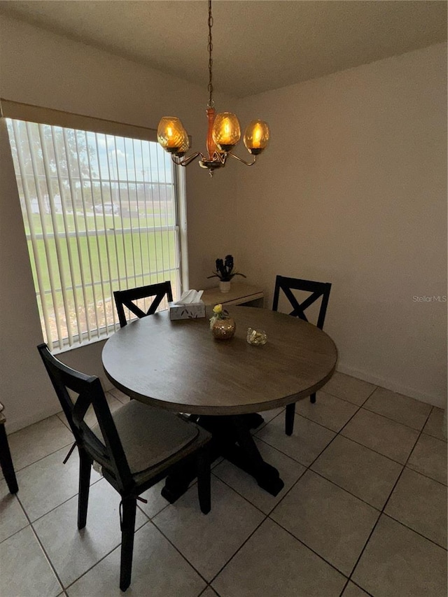 12104 Boynton Ln, New Port Richey, FL 34654 - dining space featuring light tile patterned floors