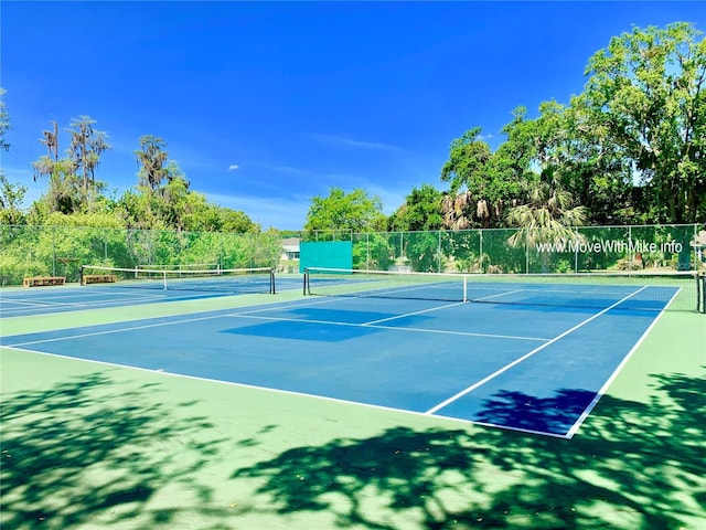 12104 Boynton Ln, New Port Richey, FL 34654 - view of tennis court with community basketball court