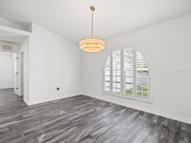 15430 Oakcrest Cir, Brooksville, FL 34604 - unfurnished dining area with dark wood finished floors and baseboards