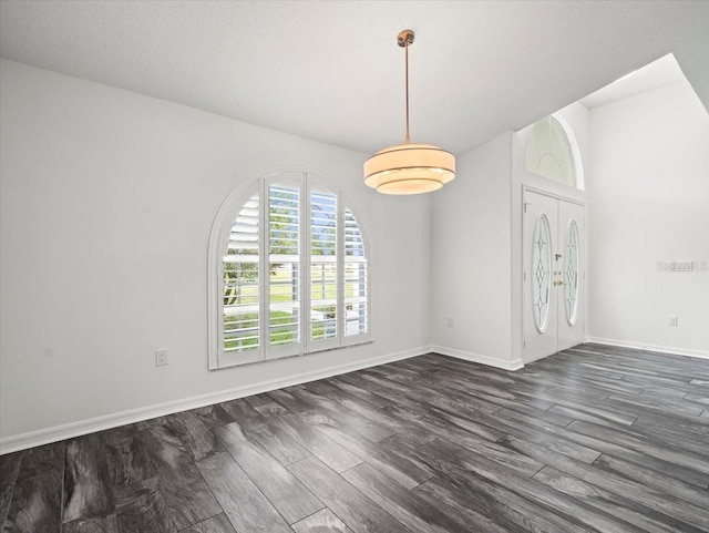 15430 Oakcrest Cir, Brooksville, FL 34604 - empty room featuring dark wood-style floors and baseboards