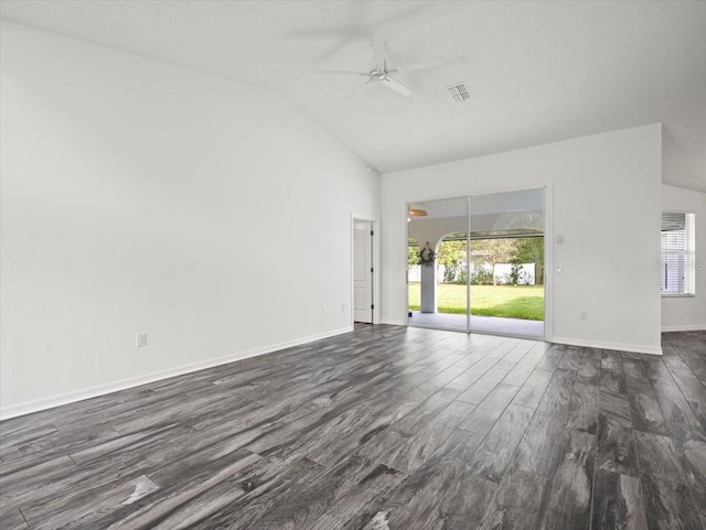 15430 Oakcrest Cir, Brooksville, FL 34604 - empty room with ceiling fan, dark wood-type flooring, and vaulted ceiling