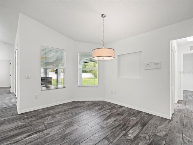 15430 Oakcrest Cir, Brooksville, FL 34604 - unfurnished dining area with dark wood-style floors and lofted ceiling