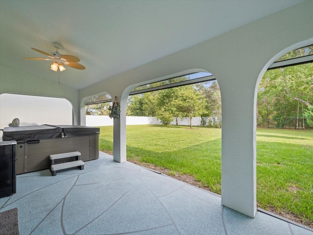 15430 Oakcrest Cir, Brooksville, FL 34604 - fenced backyard with a hot tub, a patio, and ceiling fan