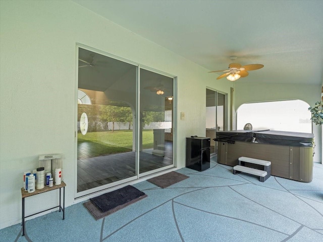 15430 Oakcrest Cir, Brooksville, FL 34604 - sunroom with a hot tub and ceiling fan