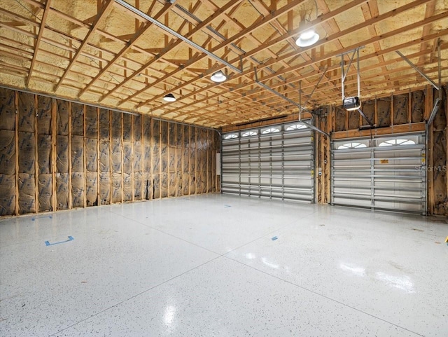 15430 Oakcrest Cir, Brooksville, FL 34604 - garage featuring a garage door opener