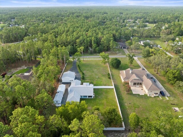 15430 Oakcrest Cir, Brooksville, FL 34604 - aerial view of property's location featuring a heavily wooded area