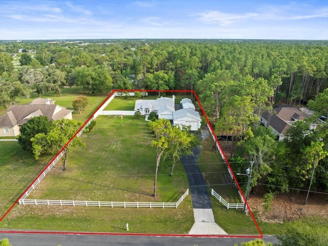 15430 Oakcrest Cir, Brooksville, FL 34604 - aerial view of property and surrounding area with a forest and property parcel outlined